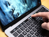 電源鍵沒了 新MacBook Pro要怎么開關(guān)機(jī)？